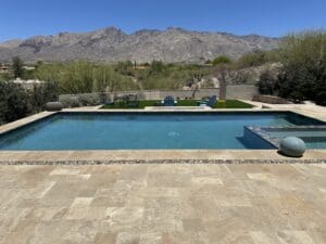 Swimming pool with mountain view background.